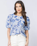 Front view of the Seeking Lola Relaxed Carefree Top in Blue Whisper showcasing the floaty fashion silhouette.