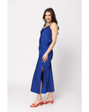 Seeking Lola Viva Skirt in Cobalt Satin blue side profile view highlighting the comfortable mid rise height clean outseam stitching paneling and functional deep fluid drape vibrant blue silhouette lines, sold by Point Break Cambridge local family surf shop at 63 Duke street.