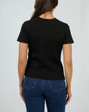 Back view of the Silent Theory Women's Regular Tee in Black showcasing the clean shoulders and straight jersey drape.