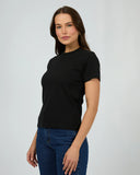 Side profile of the Silent Theory Women's Regular Tee in Black detailing the relaxed short sleeve length and neat side seams.