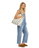 Sisstrevolution Flower Pickin' Tote Bag in Sea Salt white side profile view highlighting the comfortable over-the-shoulder carry straps and flat seam construction, sold by Point Break Cambridge local family surf shop at 63 Duke street.