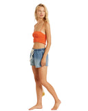 Sisstrevolution Kai Woven Tank Top in Cayenne red side profile view highlighting the comfortable low-profile armhole cut and clean hem stitching, sold by Point Break Cambridge local family surf shop at 63 Duke street.