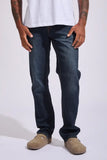  Front view of the Volcom Solver Modern Fit Denim Jeans in New Vintage Blue wash showing the straight leg cut and five-pocket setup.