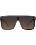 Spy Flynn Sunglasses in Honey Tort with Happy Dark Brown Fade lenses front view showcasing the oversized retro-inspired shield silhouette seamless brown gradient mono-lens distinctive honey tortoiseshell frame detailing and signature Spy Optic styling, sold by Point Break Cambridge local family surf shop at 63 Duke Street.