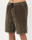 T&C Ninetees Cord Short in Olive green side profile view showing the comfortable casual outseam length and regular roomy leg opening profile, sold by Point Break Cambridge local family surf shop at 63 Duke street.