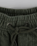 T&C Whaler Cord Short in Military green close up view highlighting the thick premium cotton corduroy fabric ridges metallic hardware details and internal waist lining, sold by Point Break Cambridge local family surf shop at 63 Duke street.