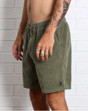 T&C Whaler Cord Short in Military green side profile view showing the comfortable casual outseam length and regular roomy leg opening profile, sold by Point Break Cambridge local family surf shop at 63 Duke street.