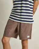 Model wearing the Rhythm Textured Linen Jam Short - Chocolate on a plain background