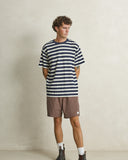 Model wearing the Rhythm Textured Linen Jam Short - Chocolate on a plain background