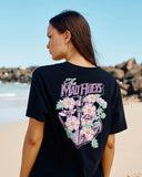 The Mad Hueys Anchor Ladybug Womens SS Tee in Black back view showing the relaxed straight silhouette and clean black premium cotton panel, sold by Point Break Cambridge local family surf shop at 63 Duke street.