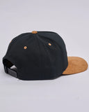 The Mad Hueys Ball Twill Snapback in Black back view showing the premium panel construction and adjustable plastic snap back closure, sold by Point Break Cambridge local family surf shop at 63 Duke street.