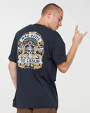 The Mad Hueys Dragon Captain SS Tee in Navy blue back view showing the relaxed straight silhouette and bold oversized custom nautical dragon art graphic print, sold by Point Break Cambridge local family surf shop at 63 Duke street.