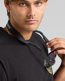 The Mad Hueys Hueys Sun Strap in Black side profile view showing the sleek low profile lay flat design, sold by Point Break Cambridge local family surf shop at 63 Duke street.