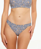 A pair of Togs Savanna Bikini Briefs with a multicolor animal print, modeled from the waist down. Front view of the Togs Savanna Bikini Brief in the animal print pattern showing the mid-rise waist and clean front profile.