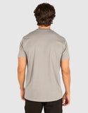 Man wearing a beige t-shirt on a white background