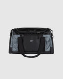 Unit Trail Duffle Bag front view showing the rugged weather resistant paneling heavy duty zipper tracks and prominent printed front brand logo, sold by Point Break Cambridge local family surf shop at 63 Duke street.