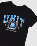Unit Kids Track Tee in Black close up view highlighting the premium soft cotton knit fabric weave texture and high-density children screen print graphic finish detail, sold by Point Break Cambridge local family surf shop at 63 Duke street.