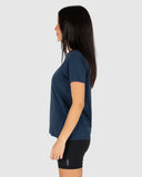 Unit Ladies Parker Tee in Navy blue side profile view showing the comfortable casual short sleeve length and clean flat-stitched hemline, sold by Point Break Cambridge local family surf shop at 63 Duke street.