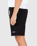 Unit Mens Boulevard Track Shorts in Black side profile view showing the casual relaxed fit outseam length cut and functional deep side hand pocket entry lines, sold by Point Break Cambridge local family surf shop at 63 Duke street.