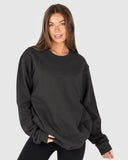 Unit Unisex Central Crew in Washed Black front view showing the comfortable classic crew neck design and bold front graphic logo print, sold by Point Break Cambridge local family surf shop at 63 Duke street.