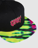 Unit Youth Trance Flat Peak Snapback Hat in Black close up view highlighting the dense raised front logo embroidery thread and internal performance structural sweatband tape detailing, sold by Point Break Cambridge local family surf shop at 63 Duke street.