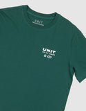 Unit Youth Major Tee in Forest Green close up view highlighting the premium soft cotton knit fabric weave texture and high-density youth screen print graphic finish detail, sold by Point Break Cambridge local family surf shop at 63 Duke street.