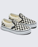 Pair of checkered slip-on shoes on a white background