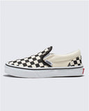 Side profile view of kids Vans Checkered Slip-On sneakers showing the signature white rubber foxing and red heel patch.
