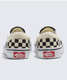 Pair of checkered vans sneakers with red Vans label on a white background