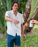 Vissla Lost Coast Short Sleeve Shirt in Vintage White front view showing the button up closure collared neck and single chest pocket, sold by Point Break Cambridge local family surf shop at 63 Duke street.