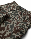 Vissla Roamer Cargo 18.5 Hybrid Boardshort in Camo print close up view highlighting the premium recycled stretch fabric texture button details and pocket flap construction, sold by Point Break Cambridge local family surf shop at 63 Duke street.