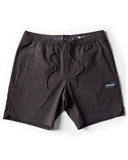 Vissla Solid Sets 17.5 Ecolastic Short in Black front view showing the comfortable elastic waistband with drawcord and tonal woven brand patch, sold by Point Break Cambridge local family surf shop at 63 Duke street.