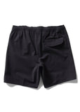 Black athletic shorts with an elastic waistband and a side pocket, shown from the back on a white background. Vissla Solid Sets 17.5" Ecolastic Short - Black