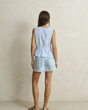 Model wearing the Rhythm Vista Stripe Tie Front Top - Blue on a plain background