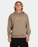 Man wearing a beige hoodie with a logo on a white background