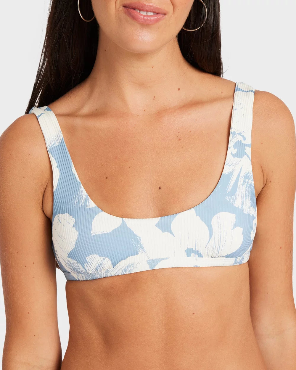 Woman wearing a blue and white patterned bikini top on a plain background Volcom Make Us Shine Tank Bikini Top - Bay Blue