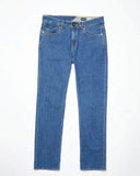 Front view of the Volcom Solver Modern Fit Denim Jeans in BDL wash showing the straight leg cut and five-pocket setup.