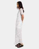 Volcom Checked Out Dress in Camouflage print side profile view highlighting the clean hemline cut and comfortable low-profile side seam construction, sold by Point Break Cambridge local family surf shop at 63 Duke street.