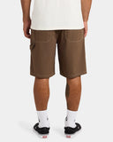 Volcom Mens Disturb Short 21 in Brown Stone back view highlighting the relaxed 21-inch silhouette, durable nylon construction, functional rear patch pockets, embroidered Volcom Stone branding and distinctive earthy brown colourway, sold by Point Break Cambridge local family surf shop at 63 Duke Street.