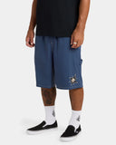 Volcom Mens Disturb Short 21 in Light Navy side profile view showcasing the comfortable loose-fitting silhouette, practical hammer loop at the left leg, lightweight nylon fabric, functional side entry pockets and relaxed skate-inspired styling, sold by Point Break Cambridge local family surf shop at 63 Duke Street.