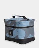 Volcom Patch Attack Deluxe Makeup Bag in Blue side profile view highlighting the sturdy webbing carry handle, sold by Point Break Cambridge local family surf shop at 63 Duke street.