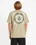 Person wearing a beige t-shirt with a graphic design on the back against a white background. Volcom Round Out Youth SS Tee - Green Tee