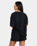 Volcom Womens Bloomz Short in Black back view showing the straight regular drape silhouette and premium lightweight stitch lines, sold by Point Break Cambridge local family surf shop at 63 Duke street.