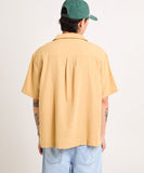 Back view of the Wrangler Bowlarama Short Sleeve Shirt in Wheat highlighting the clean shoulder yoke and fluid fabric drape.