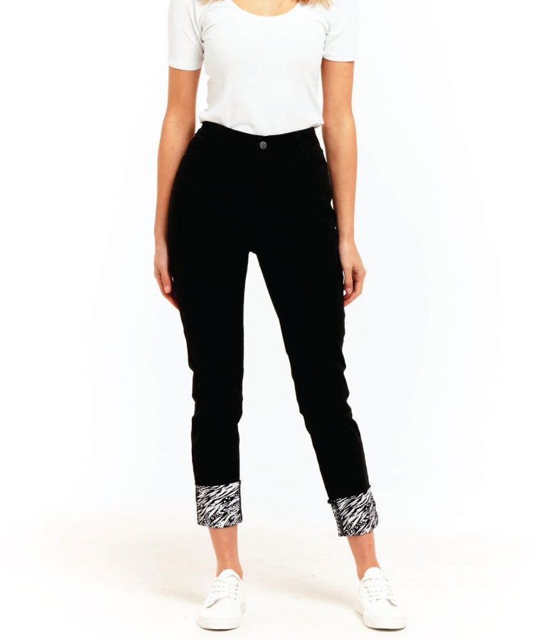 A pair of women's black straight-leg jeans with a printed cuff, mid to high rise, and a skinny leg cut. Betty Basics Remi Jean - Black
