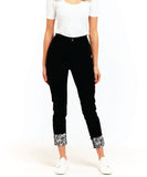 A pair of women's black straight-leg jeans with a printed cuff, mid to high rise, and a skinny leg cut. Betty Basics Remi Jean - Black