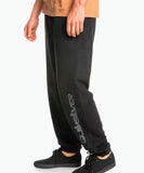 Side view of quicksilver black track pants
