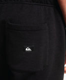 Close up of back pocket logo quicksilver mens track pants black