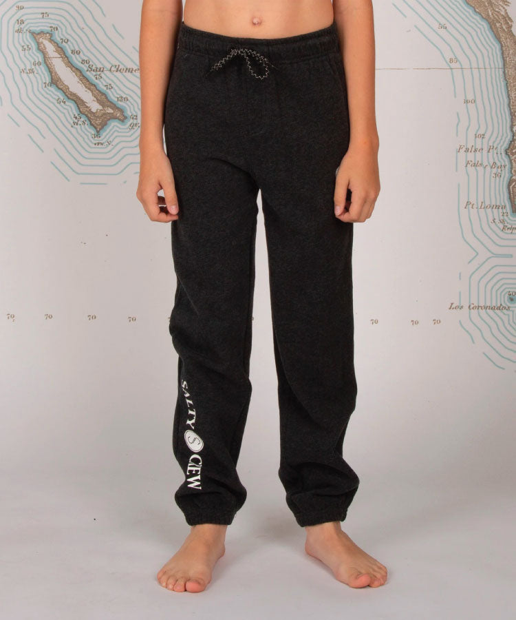 A pair of black heather sweatpants for boys by Salty Crew, featuring a custom drawcord and a single back pocket with snap closure. Salty Crew Slow Roll Boys Sweatpant - Black Heather