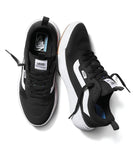 A pair of Vans Ultrarange Exo sneakers in black color with white details and a orange Vans label. Vans Ultrarange Exo - Black
